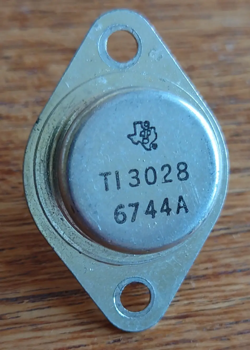 TI3028